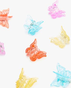 Bonneterie - Pinces en forme de papillon