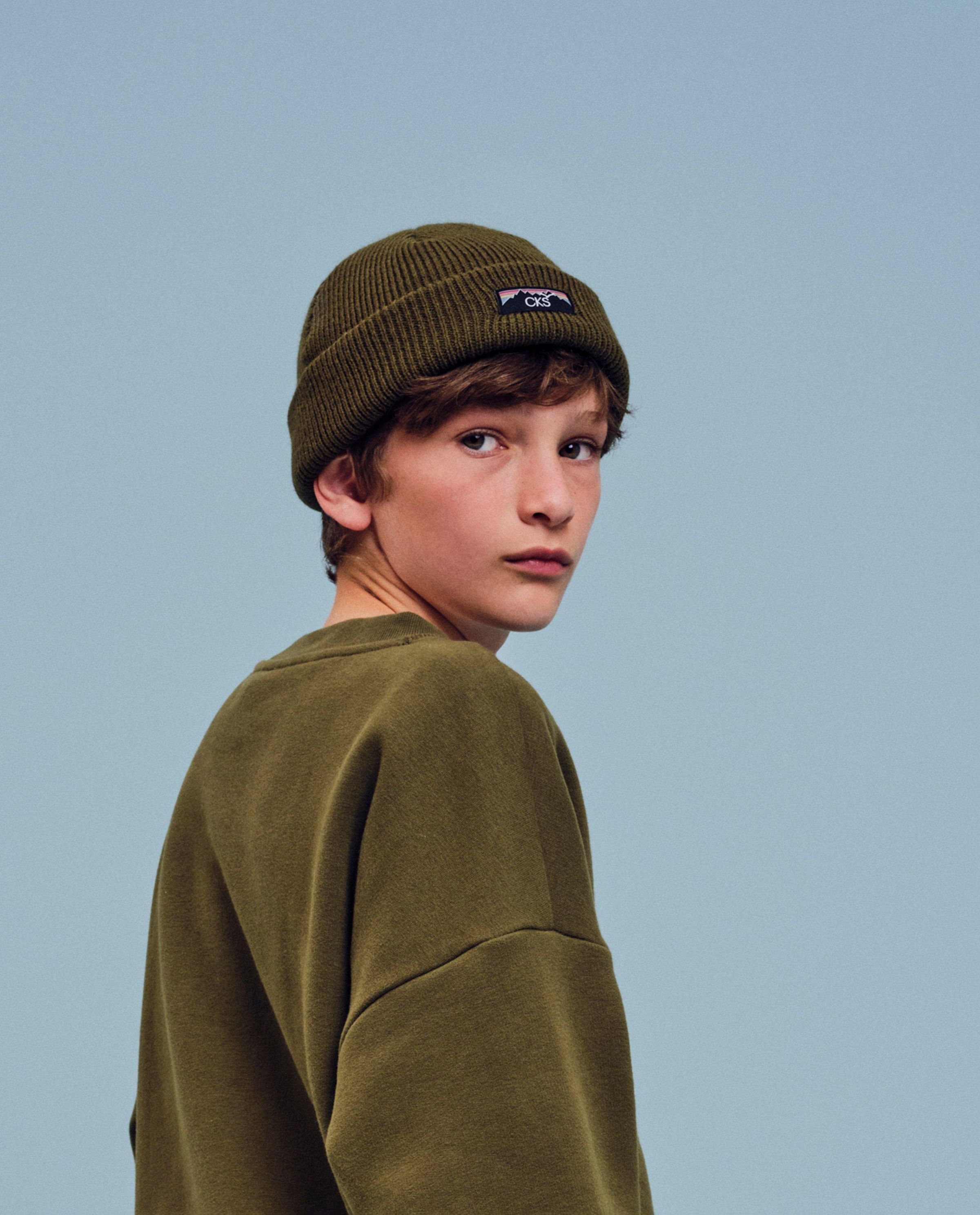 Groene muts met label - CKS