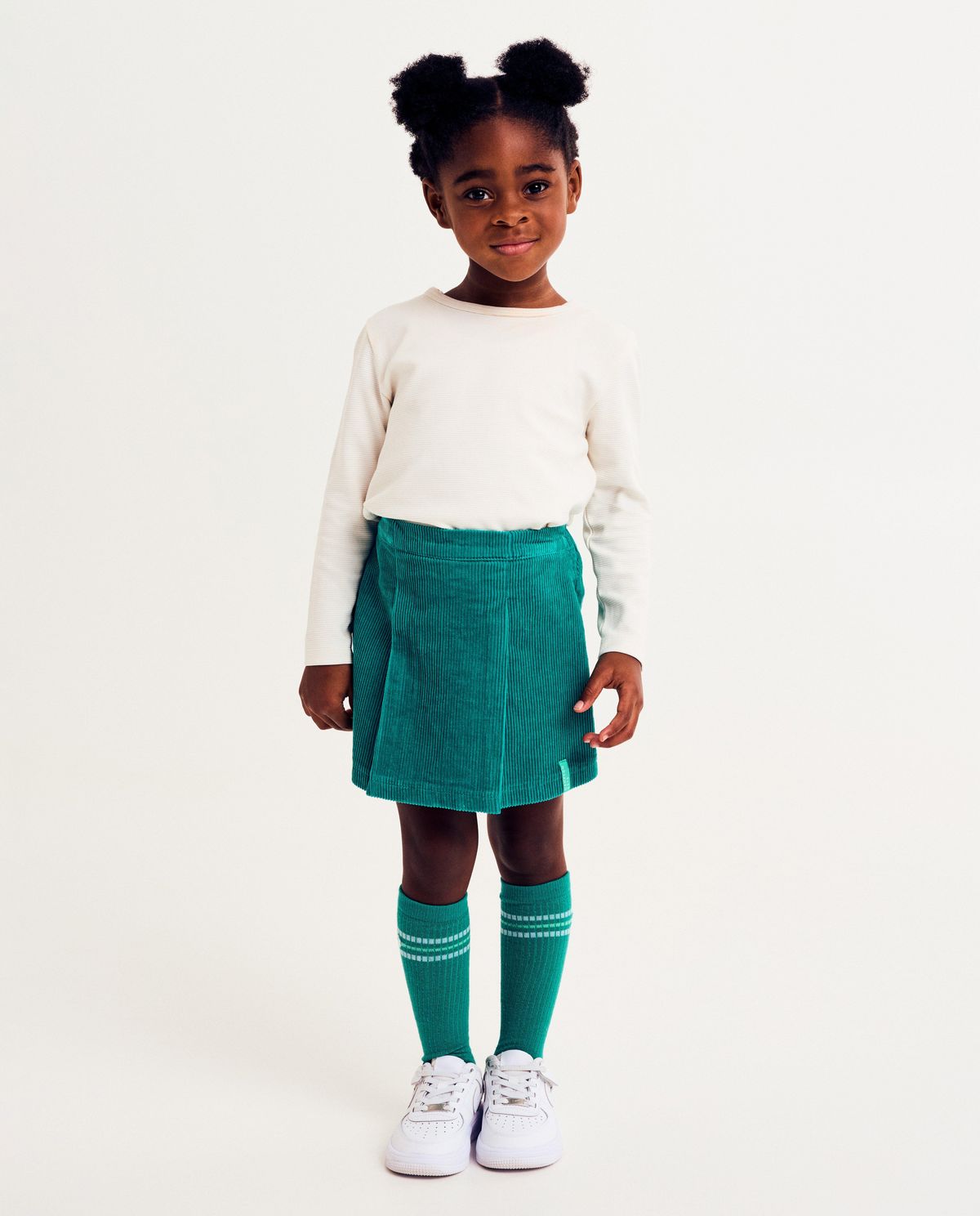 Groene skort van ribfluweel