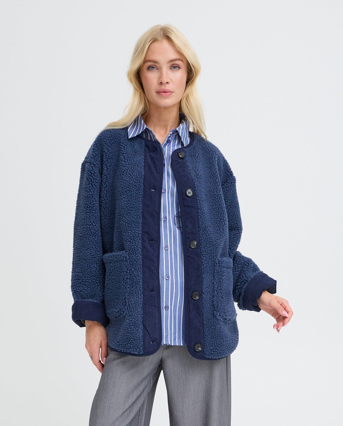 Teddy vest met ribfluwelen details