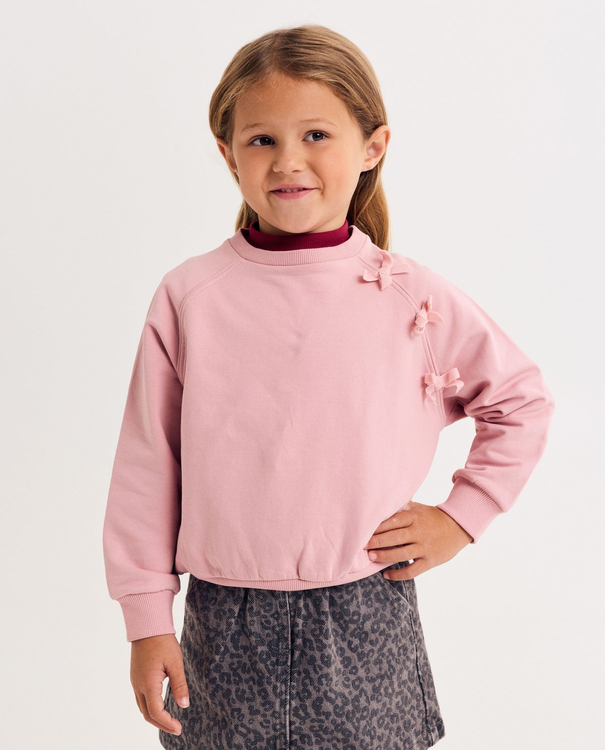 Sweater met strikjes
