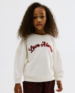 Sweater avec inscription brod&eacute;e en relief
