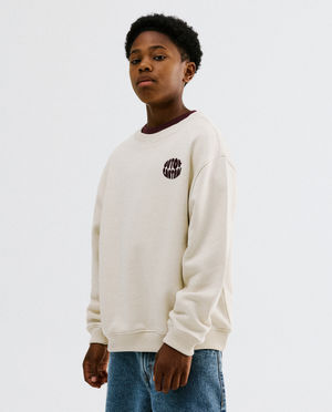 Sweater avec inscription brod&eacute;e